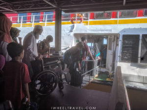 A wheelchair will not fit on the boarding platform, and there is a step to get into the boat.