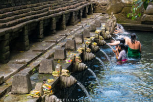 The purification pool in Tirta Empul temple.